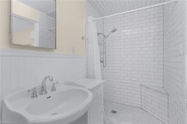 Master Bathroom with walk in shower and sink