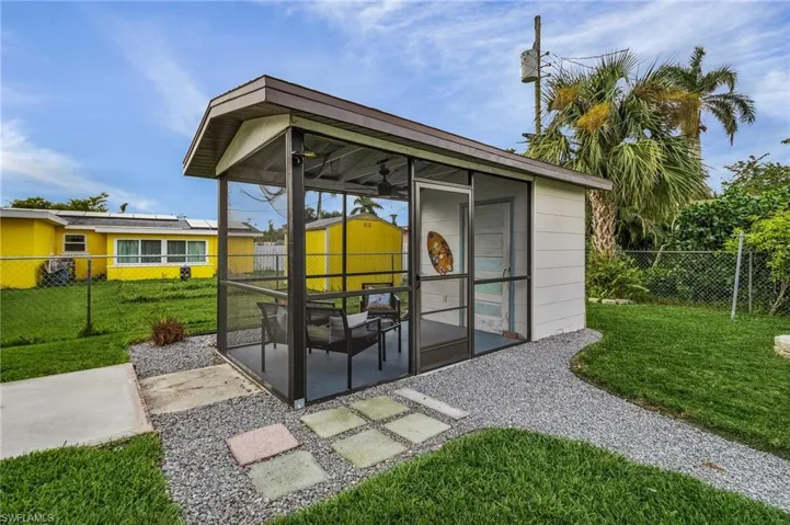 Detached screen patio with storage & electrical