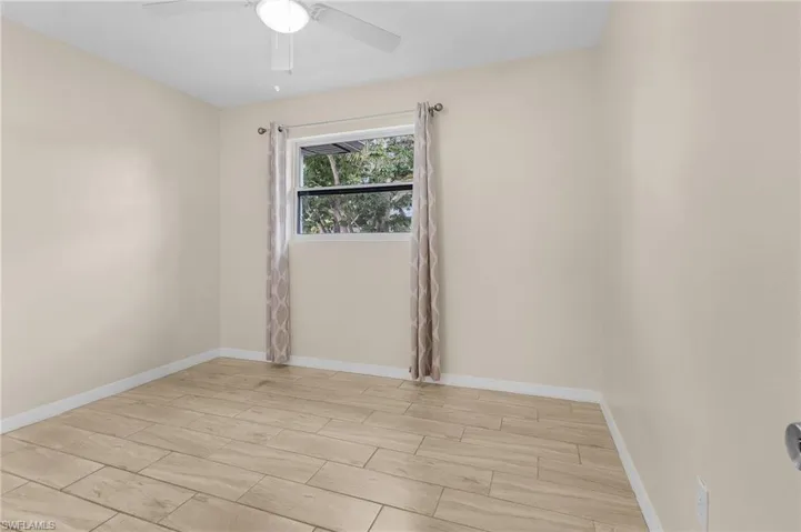 Unfurnished room with ceiling fan