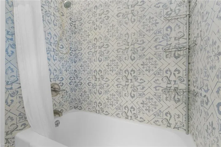 Bathroom featuring shower / tub combo
