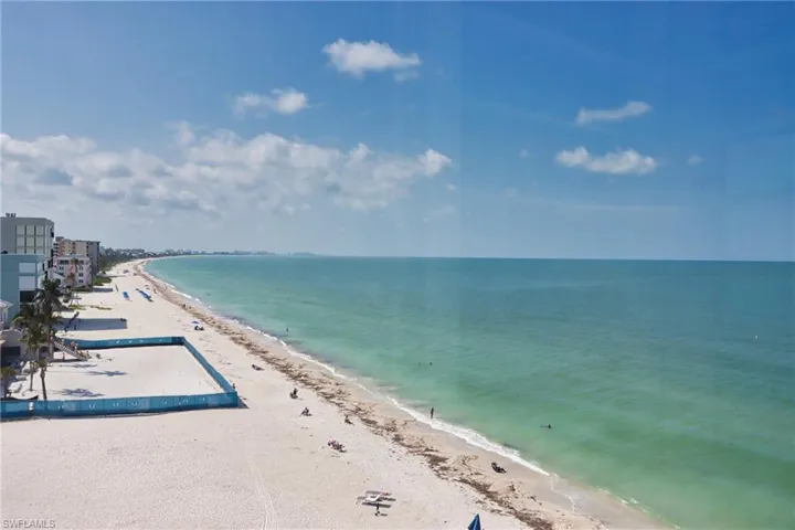 View of water feature with a beach view