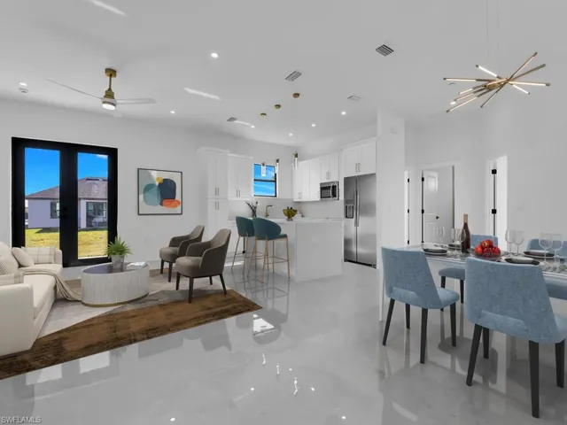 Living area with visible vents and recessed lighting