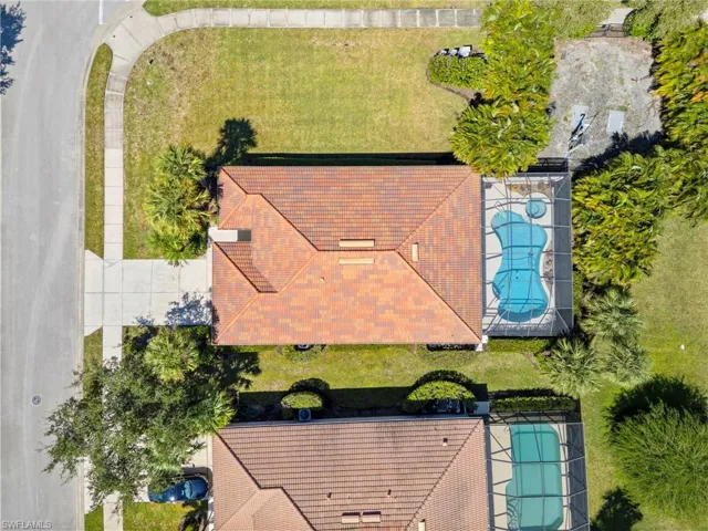 View of subject property with a pool