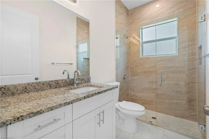 3rd bathroom located in the 2nd wing of the split plan.