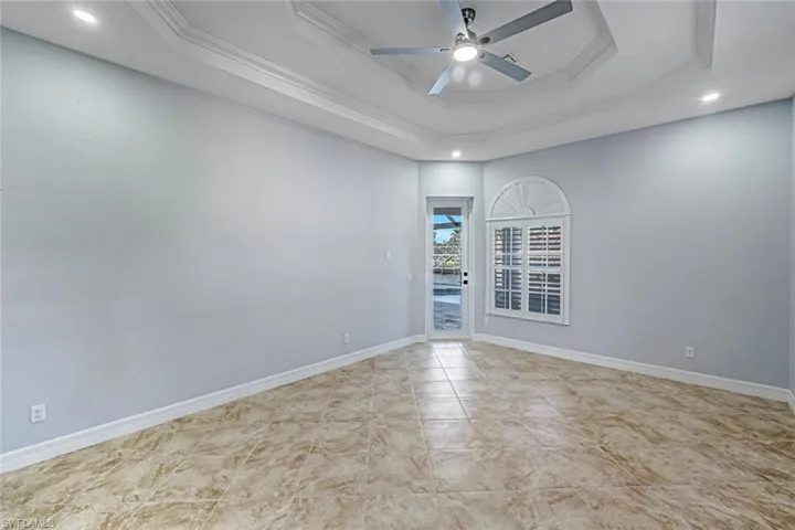 PRIMARY SUITE W OUTSIDE DOOR TO POOL