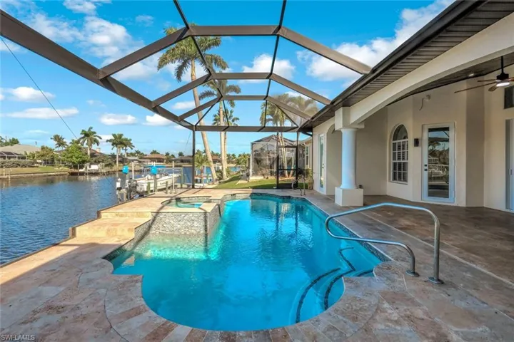STUNNING TRAVERTINE LANAI POOL/SPA