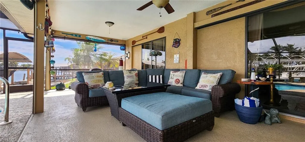 View of patio with a ceiling fan