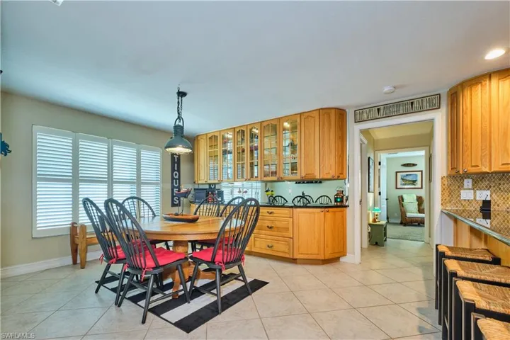 Dining room featuring baseboards and light tile patterned floors