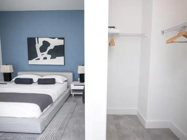 Bedroom space with a walk-in closet