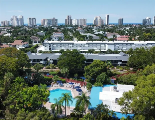 Aerial view of city skyline and a pool
