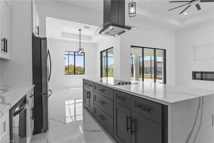 Note the designer change in the Island Cabinets to the Beautiful Dark Accent Color, Beautiful!