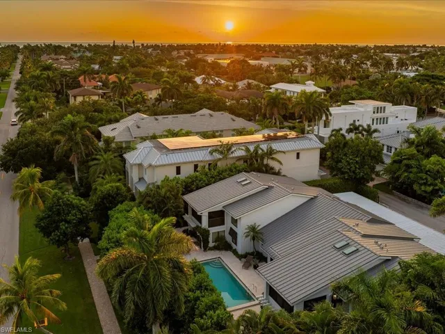 Aerial view of residential area with a pool