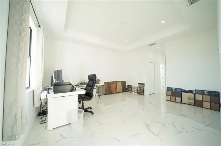 Office space with a raised ceiling