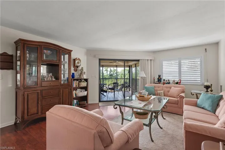 Living area featuring wood finished floors and baseboards