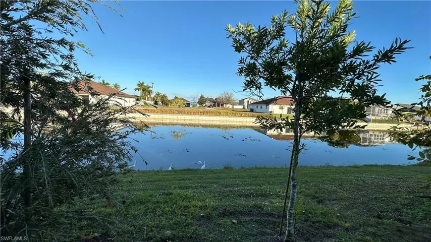 Water view with nearby suburban area