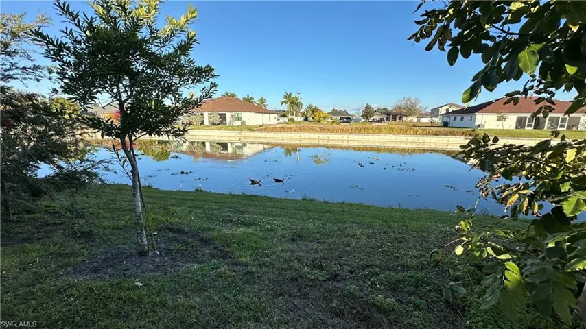 Water view with nearby suburban area