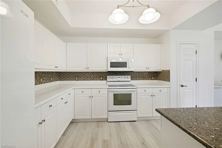 Kitchen with granite countertops