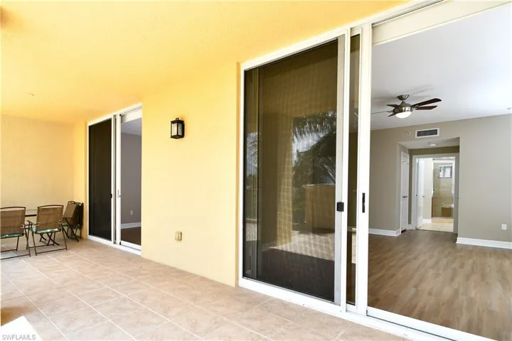 View of patio with ceiling fan