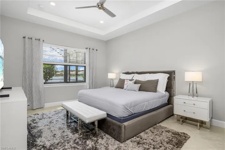 Wake up in this owner's suite that overlooks the pool and Indigo lake.