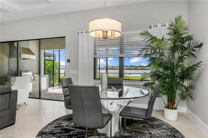 Dining room with light tile patterned floors