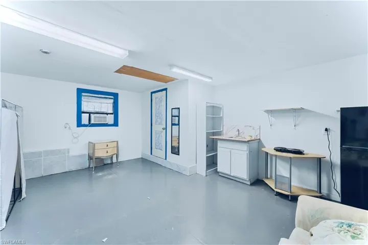 Living room with finished concrete floors