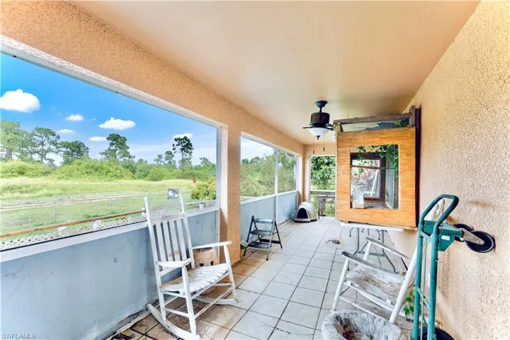 Patio / terrace featuring ceiling fan
