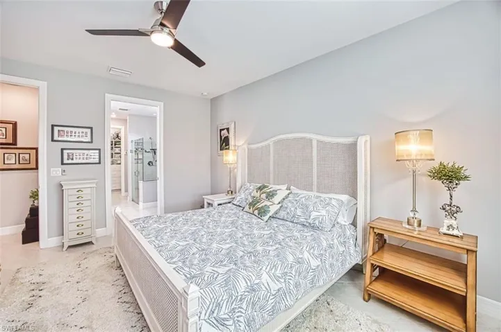 Bedroom with baseboards and a ceiling fan