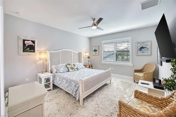 Bedroom featuring baseboards and a ceiling fan