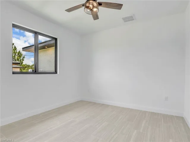 Unfurnished room with ceiling fan