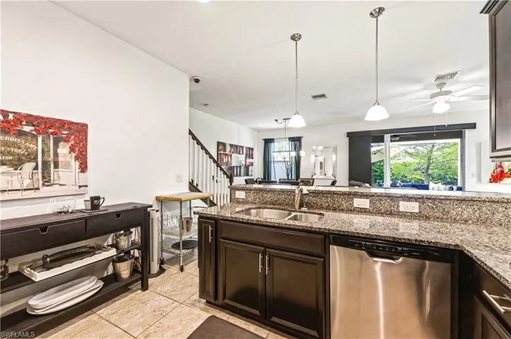 Kitchen with stainless steel appliances (refrigerator, oven, microwave and dishwasher)