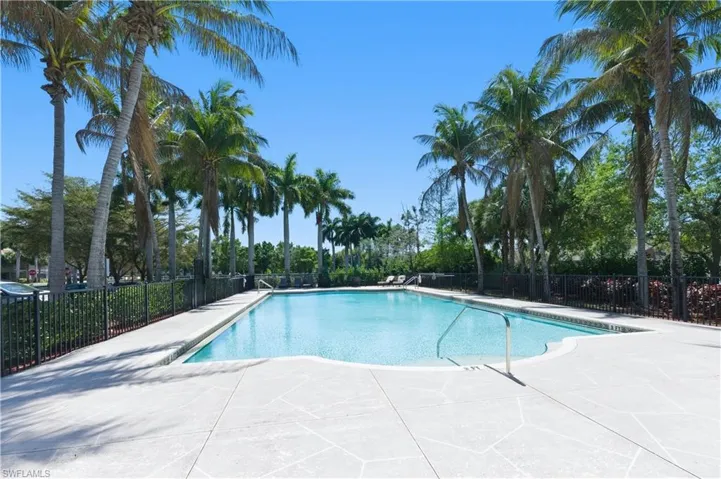 Community pool with a patio area