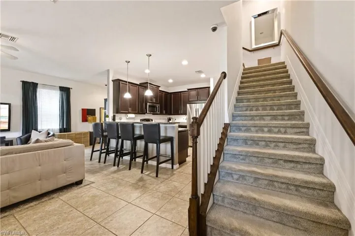 Stairway to bedrooms, loft, full bathrooms and laundry (washer & dryer)