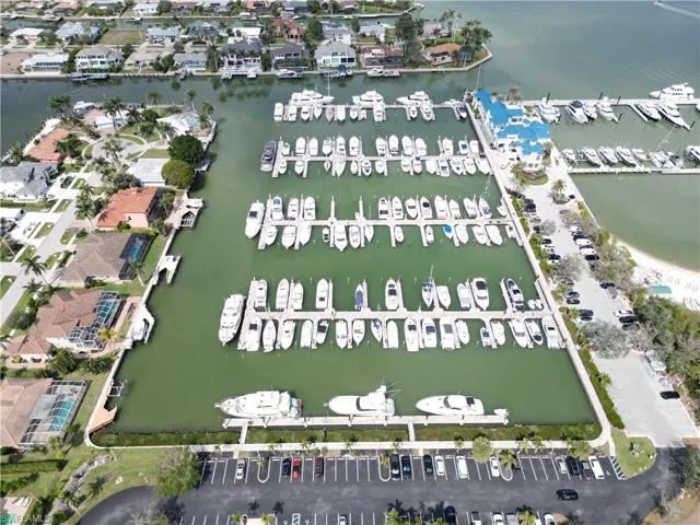 View of property location featuring a large body of water and a marina