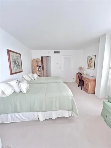 Bedroom with carpet flooring