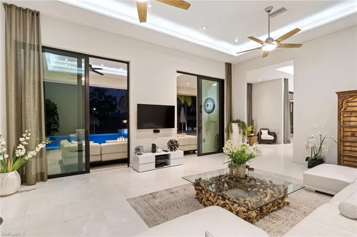 Living room featuring light tile patterned floors