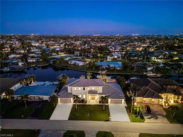 Aerial view at dusk with a water view