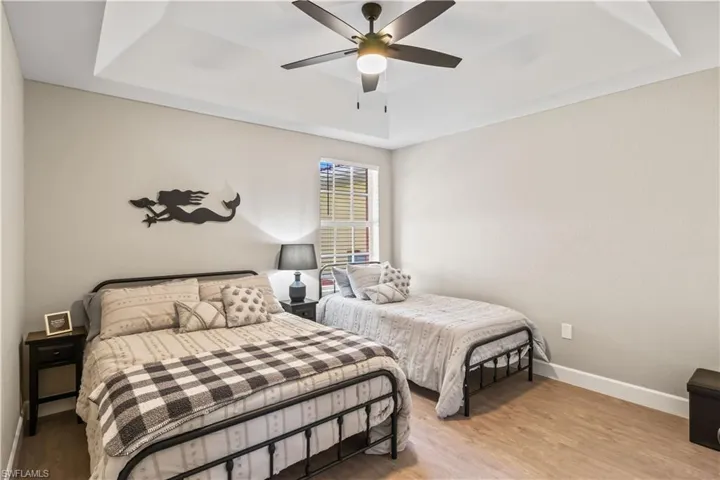 Let your guests feel right at home in this comfortable, light-filled room.