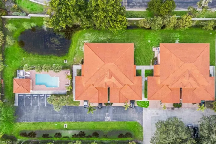 Drone view captures the clean, low-density design of this carriage-style condo building.