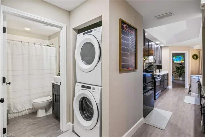 Tucked away and practical—laundry’s a breeze with this easy setup.
