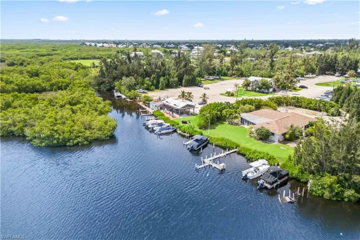 At the end of the road: Lee County's planned public boat ramp (coming 2026)—bringing incredible long-term value to this already desirable location.