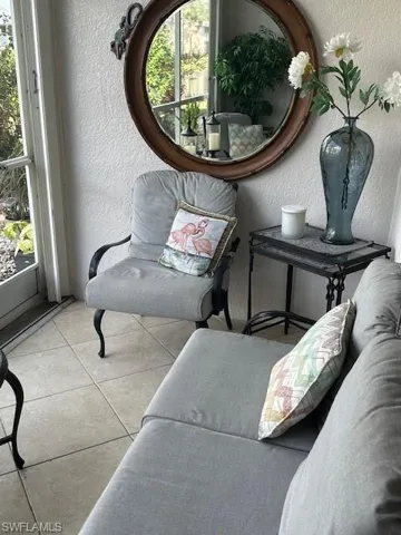 Screened lanai patio with access to lakeside picnic and BBQ area.