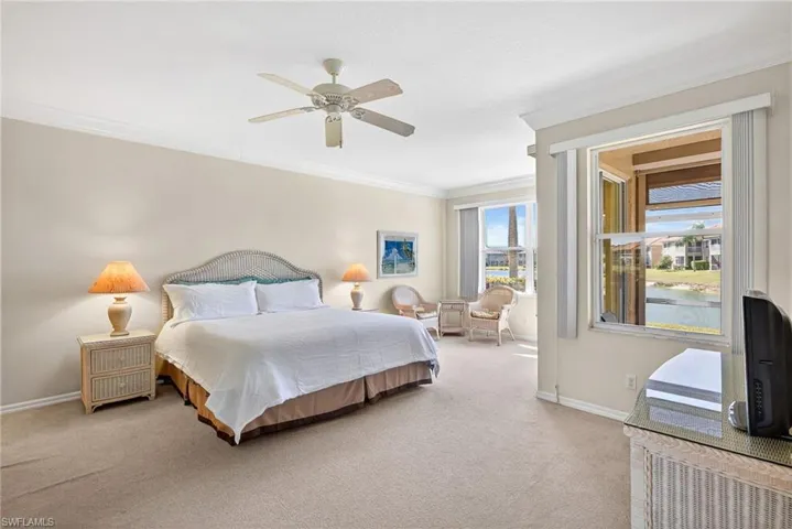 VIRTUALLY REFRESHED WITH A NEUTRAL PALETTE!  featuring crown molding, carpet, and a ceiling fan
