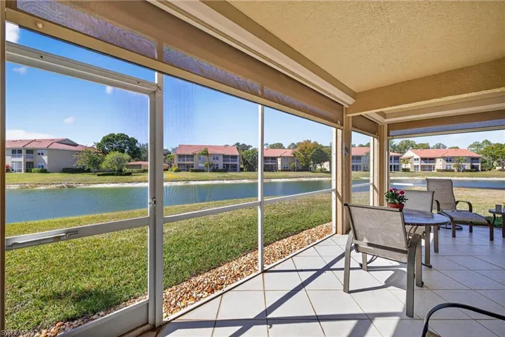 Screened lanai featuring lake views, and storm smart screesn
