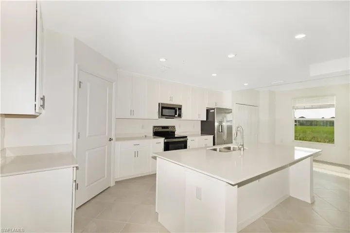 Open-layout kitchen with large island.