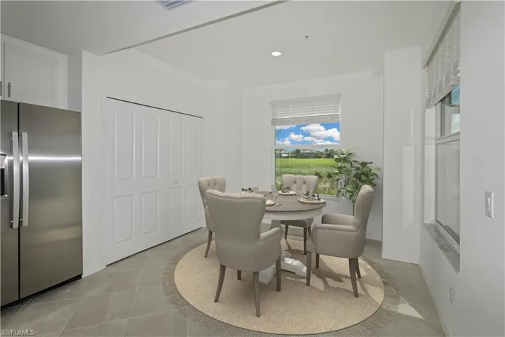 Virtually staged breakfast nook/dining area.