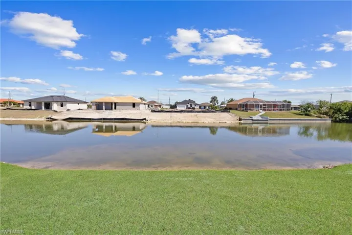 Water view featuring nearby suburban area