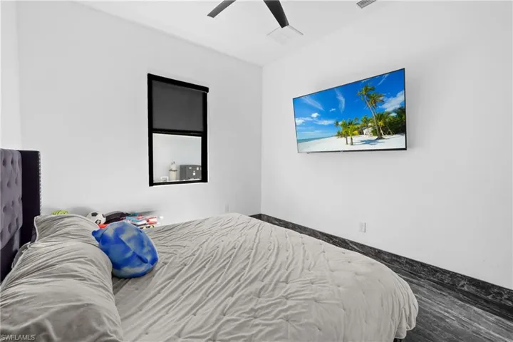 Bedroom featuring ceiling fan