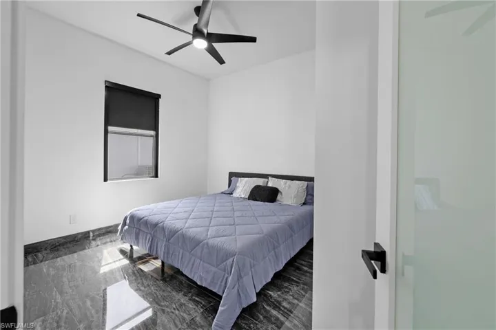 Bedroom with a ceiling fan
