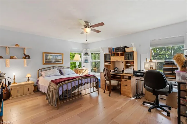 Full bath with tile patterned floors, toilet, a shower with shower curtain, and vanity
