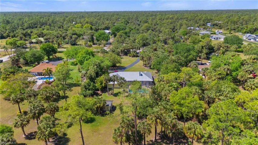 Bird's eye view with a wooded view